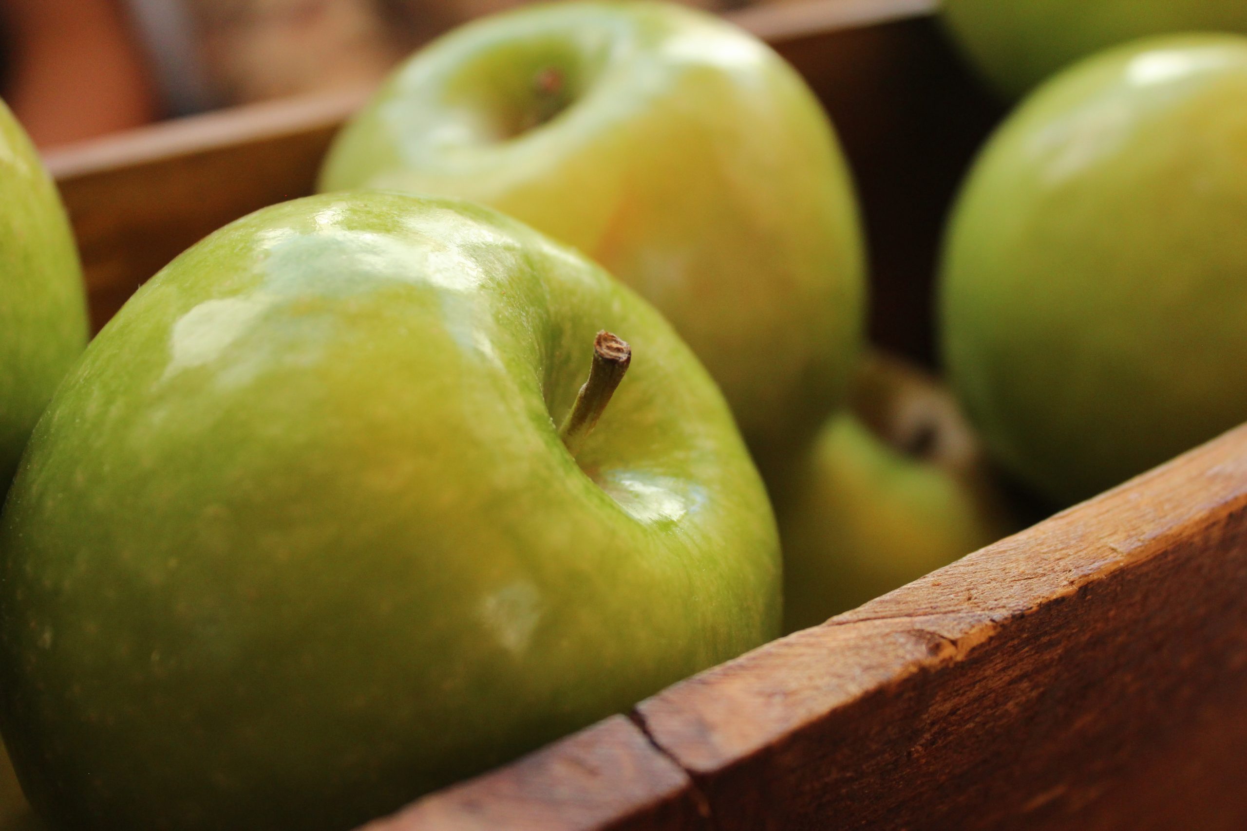 Reduce food waste (green apples pictured)