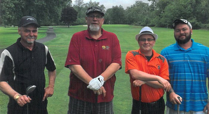 Timothy Webster, Todd Amato, William Russell & Jesse Dixon on the golf course
